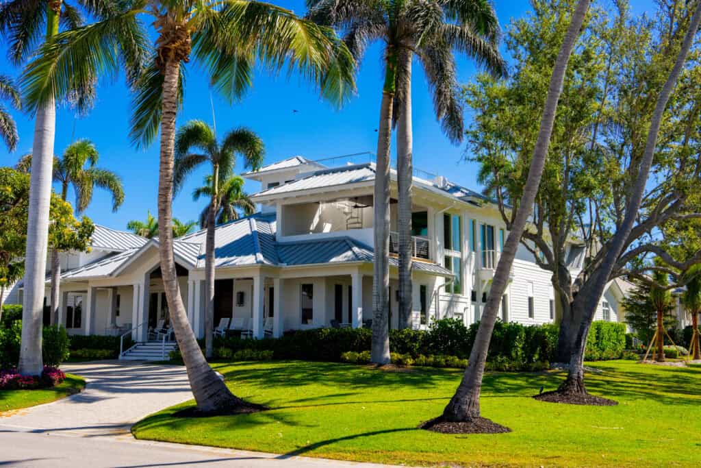 Professional Metal Roofing Services In Palm Coast FL With Expert Contractors Installing Durable Steel Roof Panels