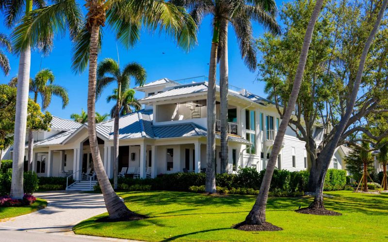 Professional Metal Roofing Services In Palm Coast FL With Expert Contractors Installing Durable Steel Roof Panels