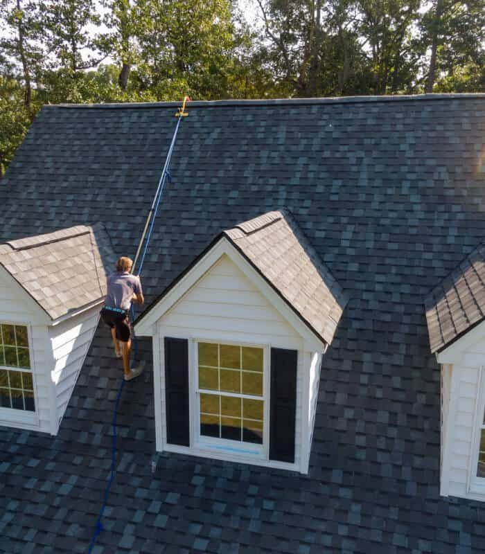 Experienced Roof Replacement Contractor In Jacksonville FL Repairing And Installing A New Roof For A Local Homeowner