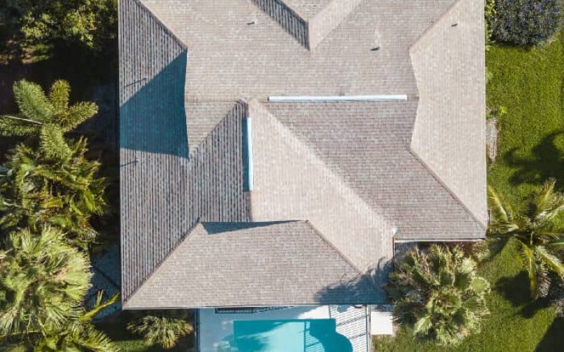 Complete Roof Replacement Project In Jacksonville FL Showing New Shingles Installed On A Residential Home